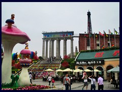 The Window of the World  is a theme park located in Overseas Chinese Town, Nanshan district, in  the western part of the city of Shenzhen in the People's Republic of China. It has about 130 reproductions of some of some  the most famous tourist attractions in the world on a size of 48 hectares. The 108 metre tall Eiffel Tower dominates the skyline and the sight of the Pyramids, Manhattan skyline (pre -9/11), Arch of Triumph, Big Ben, Washington, Bangkok temples, Angkor Vat, Colosseum, the Taj Mahal, a large Niagara Falls, Venezuela falls, a Mexican pyramid and many more famous landmarksall in proximity to each other, about 1/3 of the orignal, can be found in the theme park. There is also a full size Myanmar village, Dutch villages and European villages as well as a Japanese garden inside this enormous theme park. In the  entrance you will find an impressive fountains, and replicas of historical landmarks around the world, many in 1/3 of the orignal size, much larger then in equal theme parks in Europe for example.